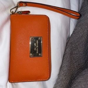 Orange Michael Kors Jet Set Wristlet